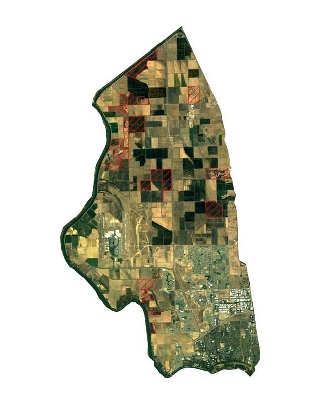 color satellite image of the Conservancy with an overlay of its approximate boundaries